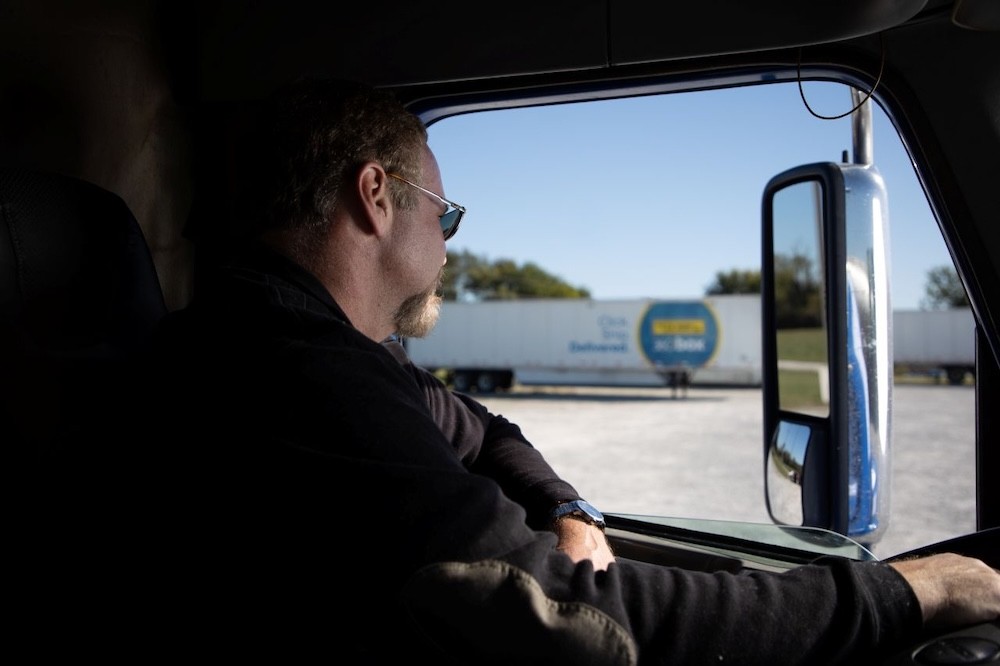 Driver looking in side mirror