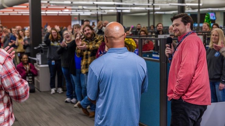 Independent Contractor of the Year, Patrick, being cheered on at the corporate celebration for his accomplishment.